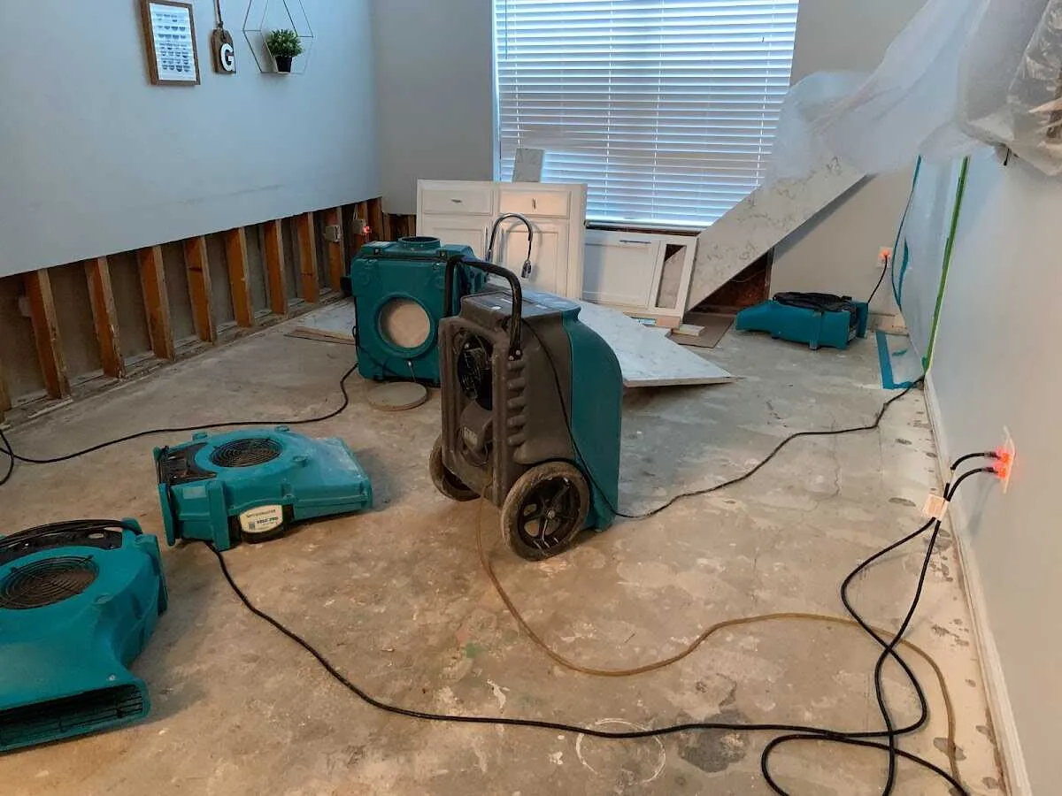 Dehumidifier in flood-cut room for Water Damage Restoration in Piney Green